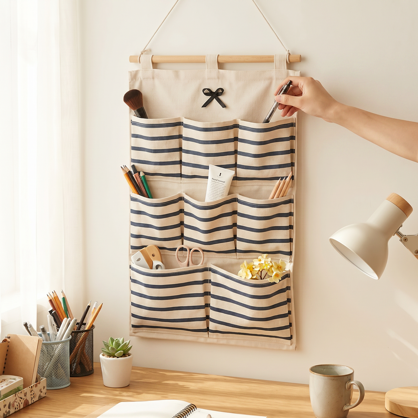 Blue eight-pocket wall organizer holding small accessories